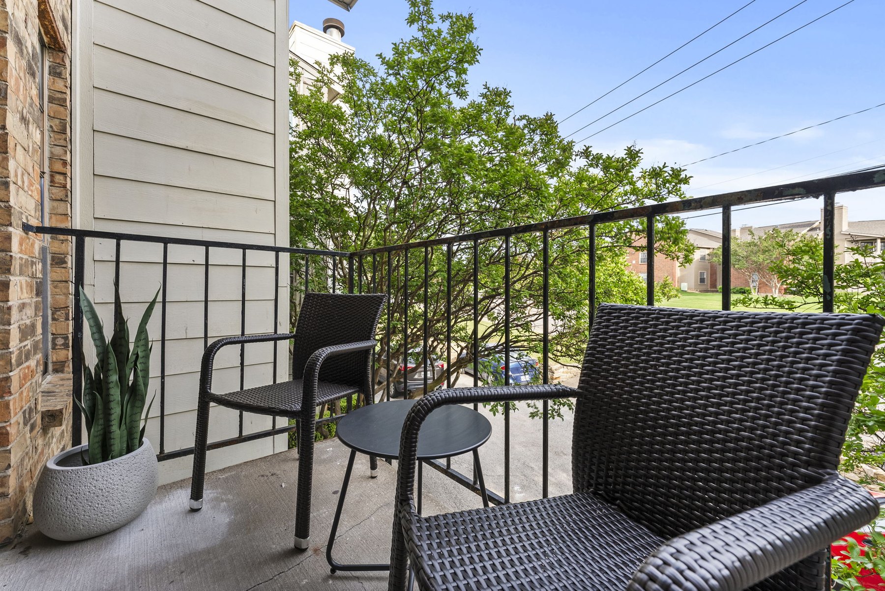 Private balcony with outdoor seating at The Modern Boho